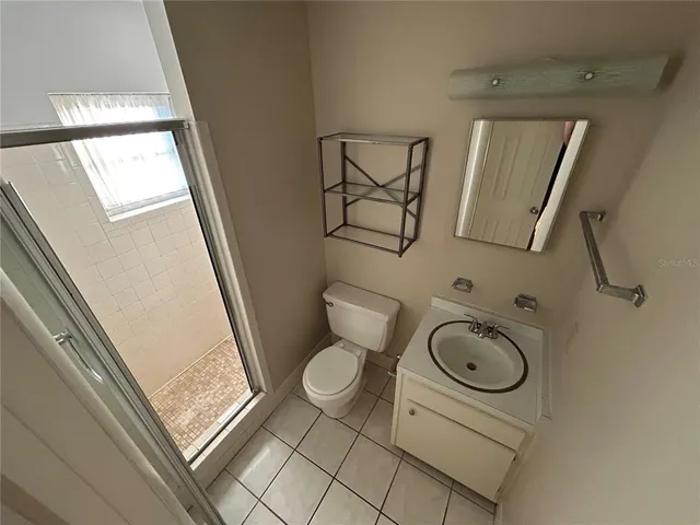 a bathroom with a toilet and a sink