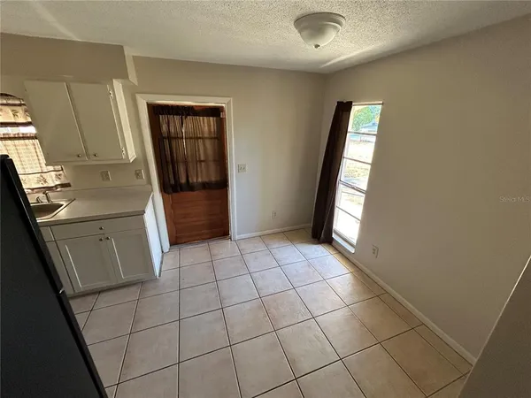 a view of a kitchen with a sink