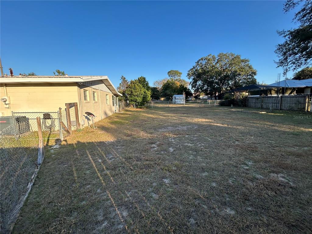 21696 Southwest Raintree Street Dunnellon, FL 34431 - Photo 32 of 35 a front view of a house with a yard