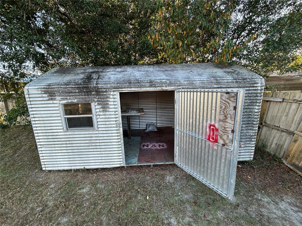 21696 Southwest Raintree Street Dunnellon, FL 34431 - Photo 35 of 35 a view of a small space in front of a house