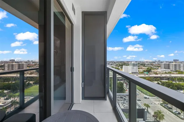 a view of a balcony with city view