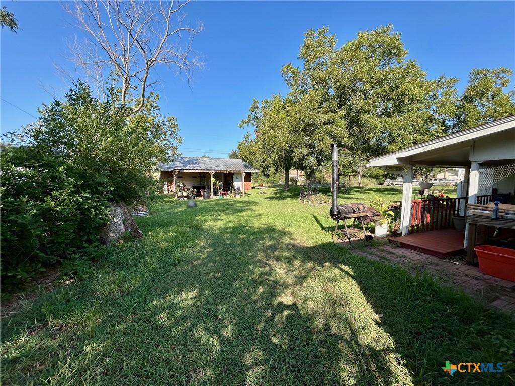 306 Dover Street Victoria, TX 77905 - Photo 19 of 23 a view of a backyard with sitting area