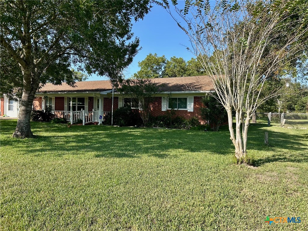 306 Dover Street Victoria, TX 77905 - Photo 2 of 23 a front view of a house with garden