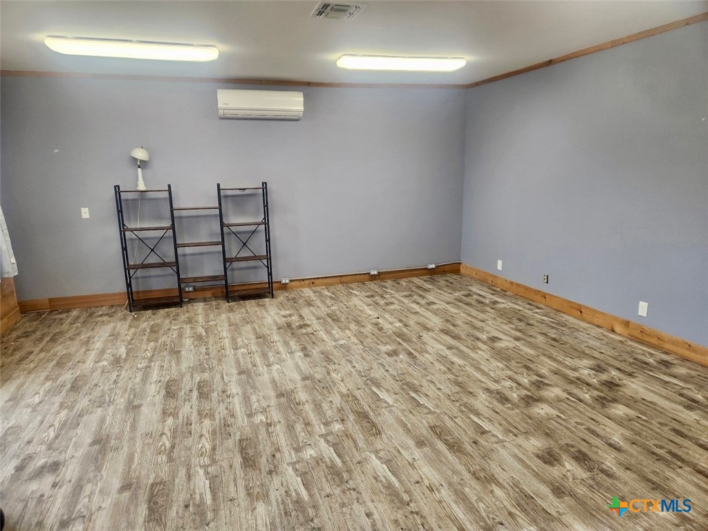 306 Dover Street Victoria, TX 77905 - Photo 7 of 23 a view of a room with wooden floor