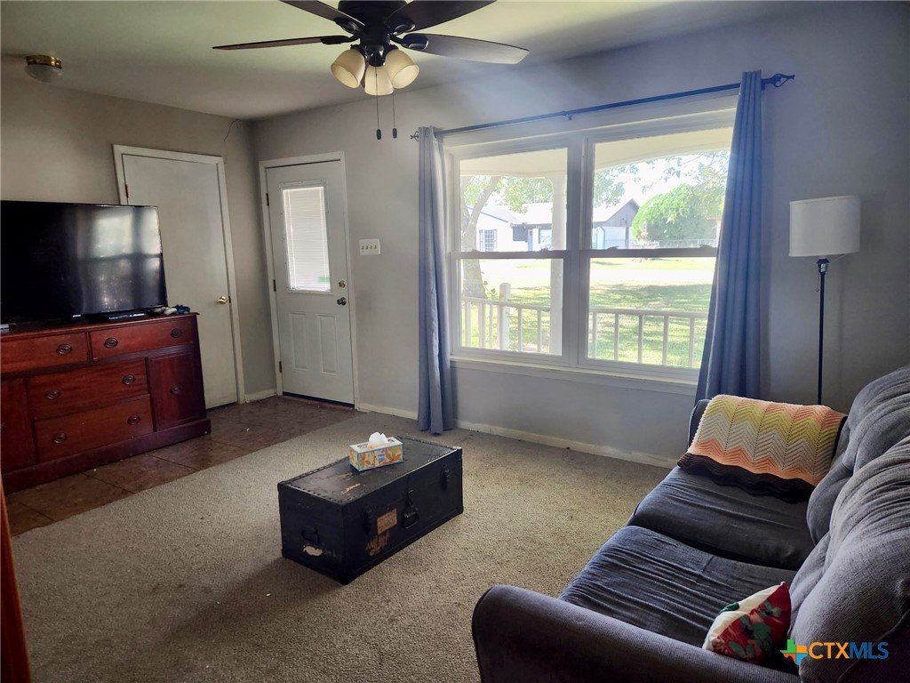306 Dover Street Victoria, TX 77905 - Photo 8 of 23 a living room with furniture and a flat screen tv