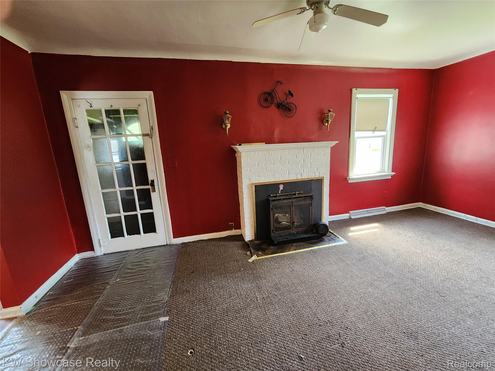 4356 South Vassar Road Burton, MI 48519 - Photo 18 of 42 Living Room wit natural Fireplace.