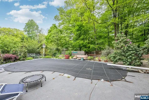 a view of a outdoor space with a swimming pool