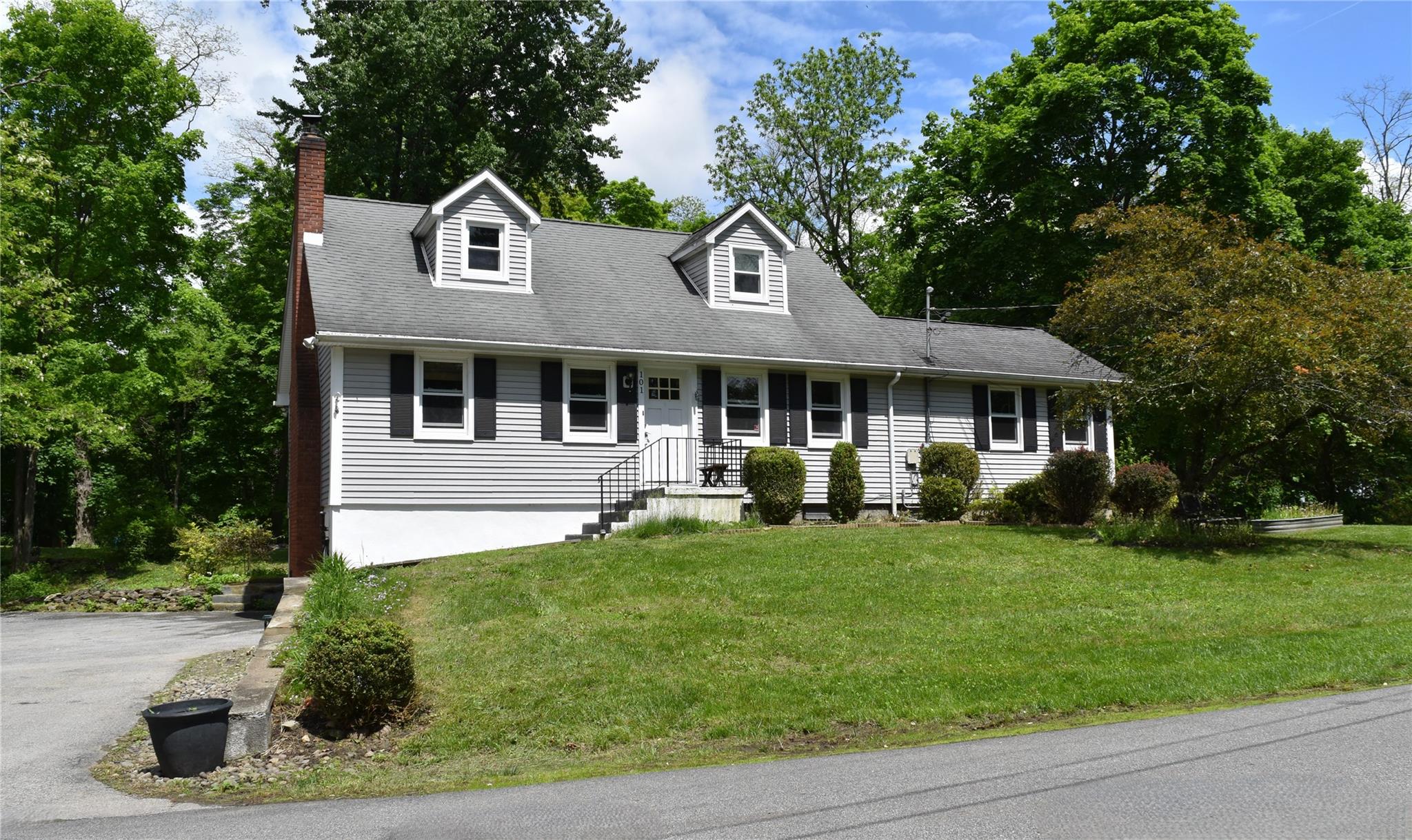101 Sunrise Hill Road Fishkill, NY 12524 - Photo 1 of 1 Cape cod-style house with a chimney and a front lawn