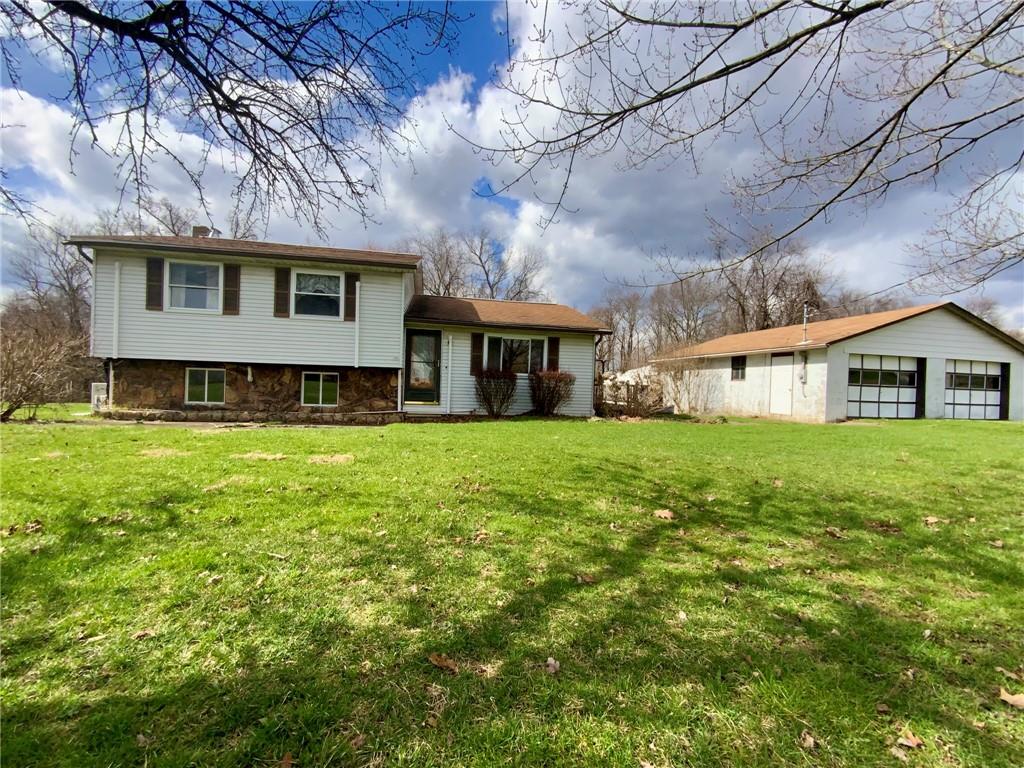 Front multi-level and 2 car detached garage