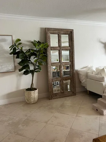 a vase of flowers sitting on a table