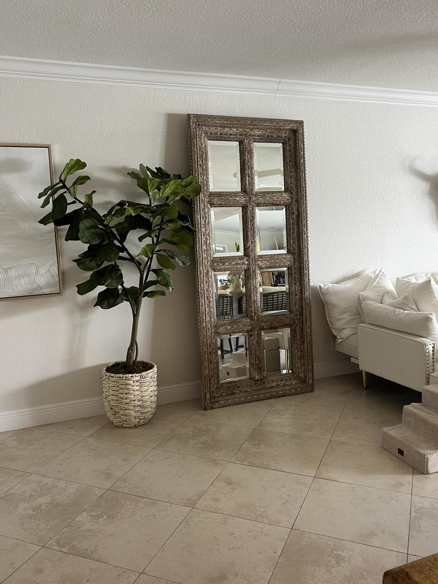 330 Southeast 20th Avenue, Unit 315 Deerfield Beach, FL 33441 - Photo 13 of 33 a vase of flowers sitting on a table