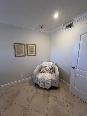 a bedroom with a bed and bathroom