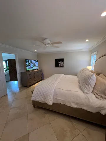 a bedroom with a bed and utility