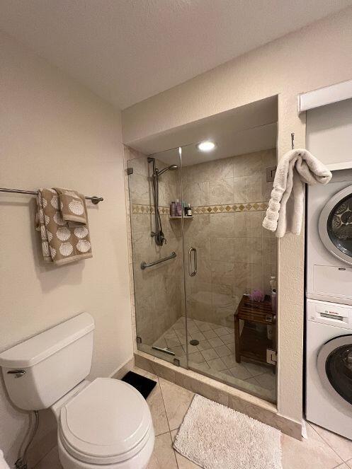 330 Southeast 20th Avenue, Unit 315 Deerfield Beach, FL 33441 - Photo 31 of 33 a bathroom with a toilet and a shower