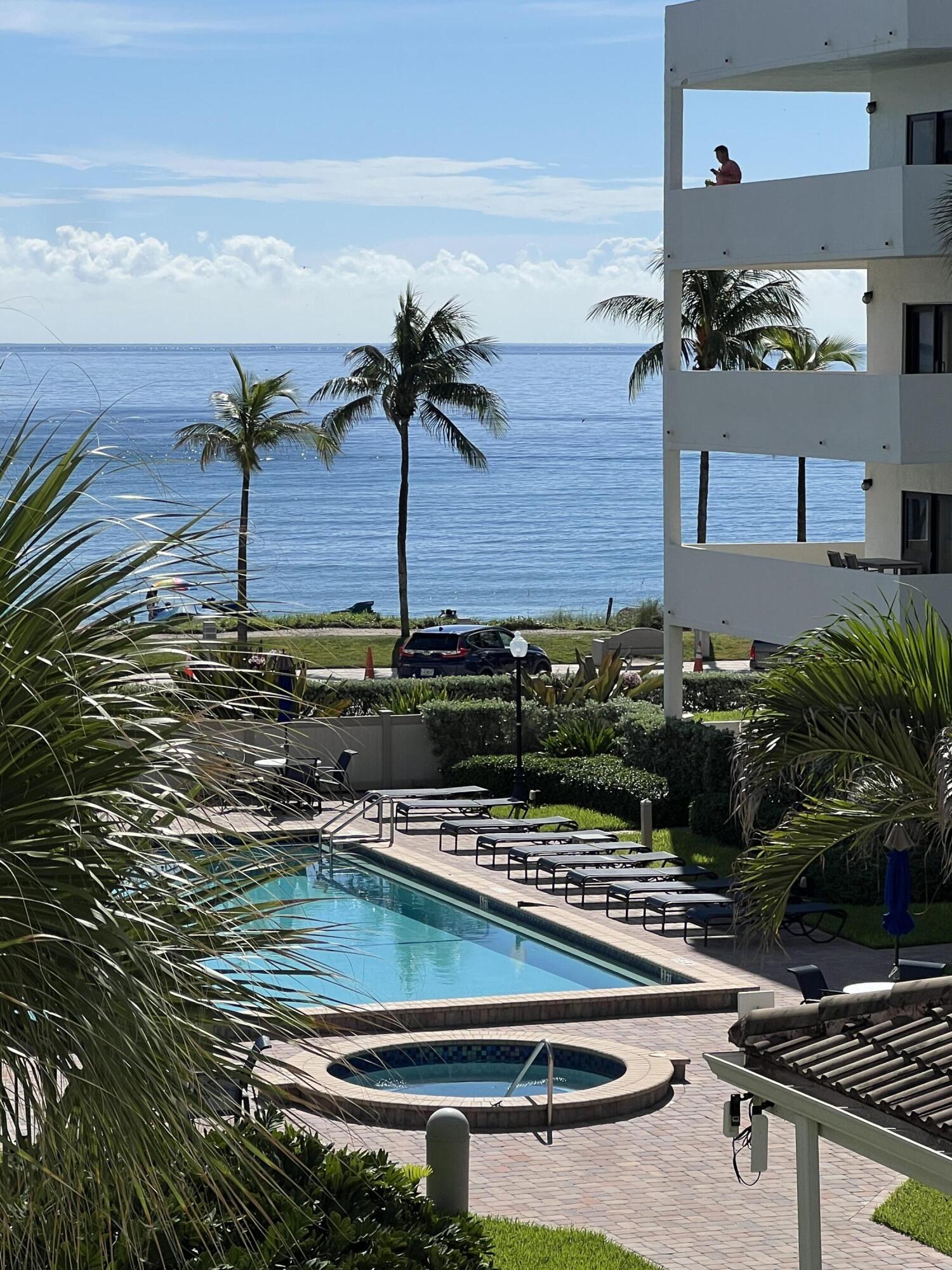 330 Southeast 20th Avenue, Unit 315 Deerfield Beach, FL 33441 - Photo 6 of 33 a view of a backyard with plants and lake view