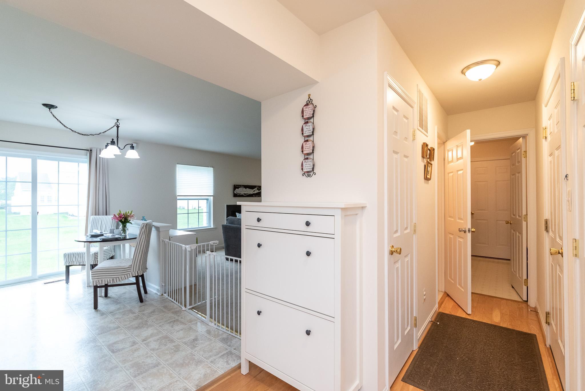 709 Walnut Grove Road Baltimore, MD 21221 - Photo 15 of 52 a view of kitchen with breakfast area and windows