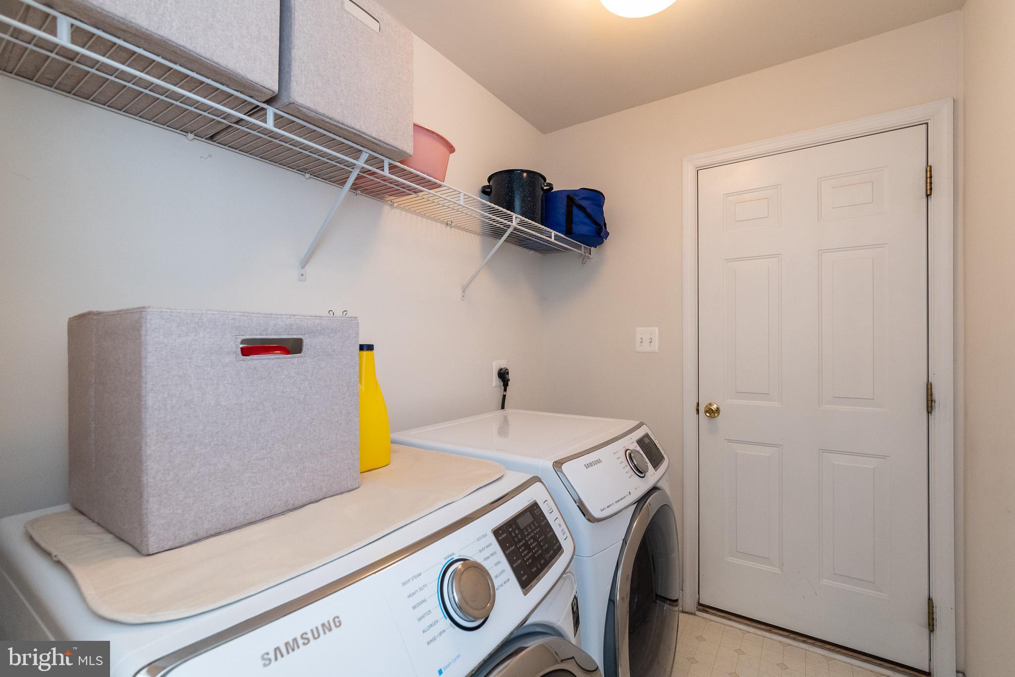 709 Walnut Grove Road Baltimore, MD 21221 - Photo 31 of 52 a utility room with dryer and washer
