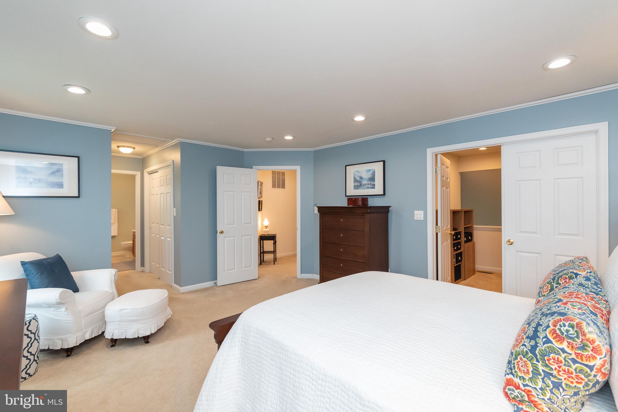 709 Walnut Grove Road Baltimore, MD 21221 - Photo 33 of 52 a bedroom with a bed and a couch