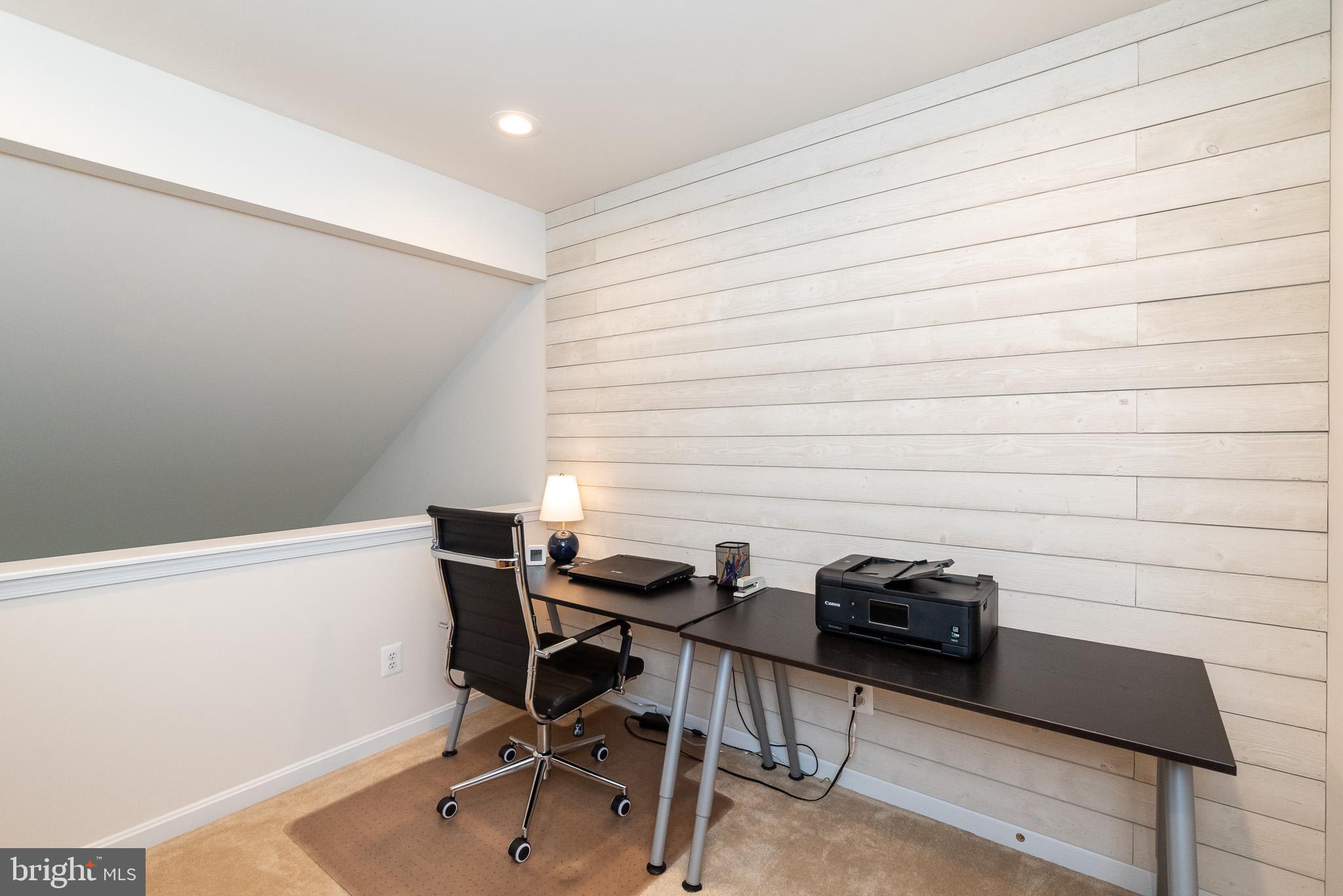 709 Walnut Grove Road Baltimore, MD 21221 - Photo 36 of 52 a view of a workspace with furniture