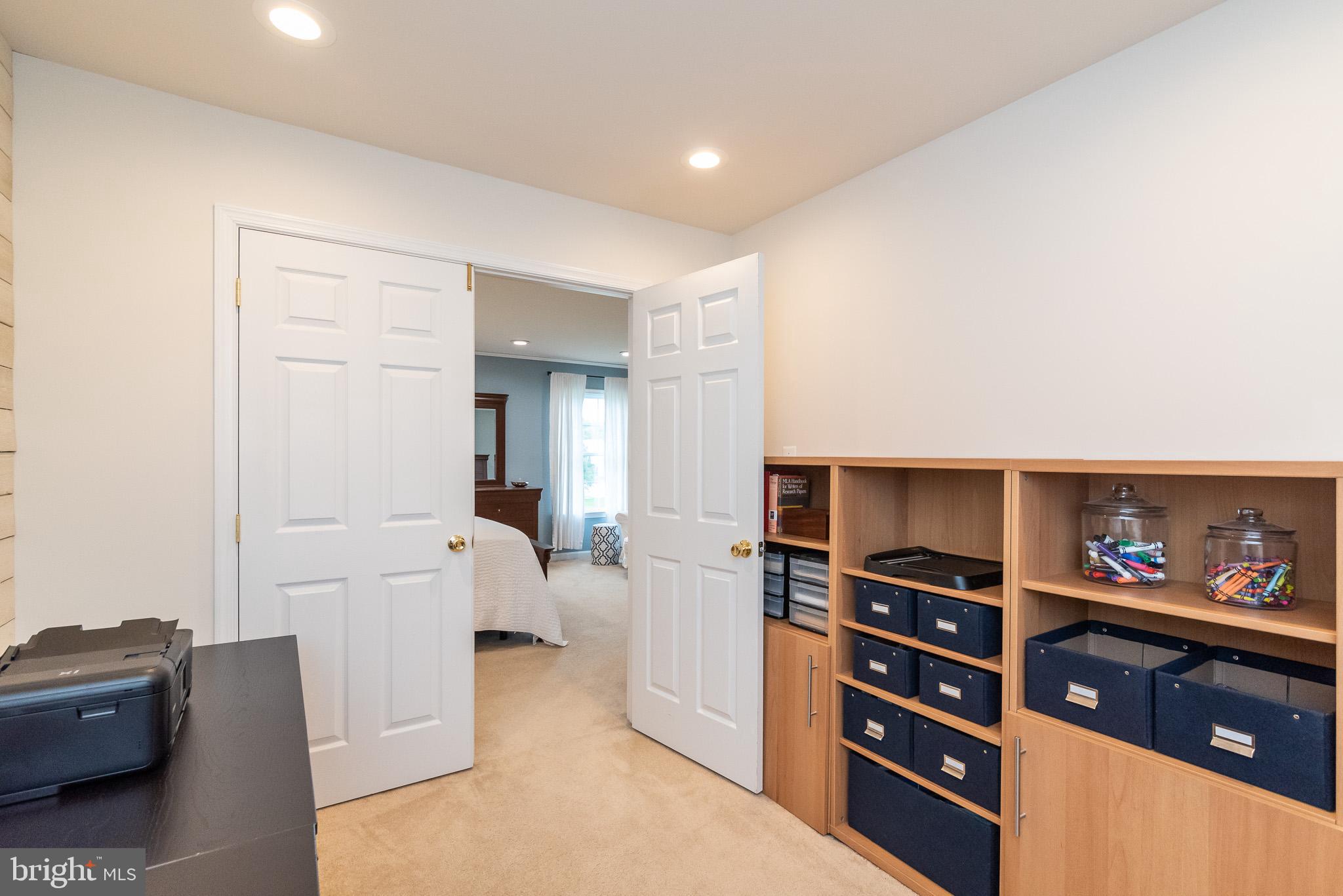 709 Walnut Grove Road Baltimore, MD 21221 - Photo 38 of 52 a living room with furniture and a flat screen tv