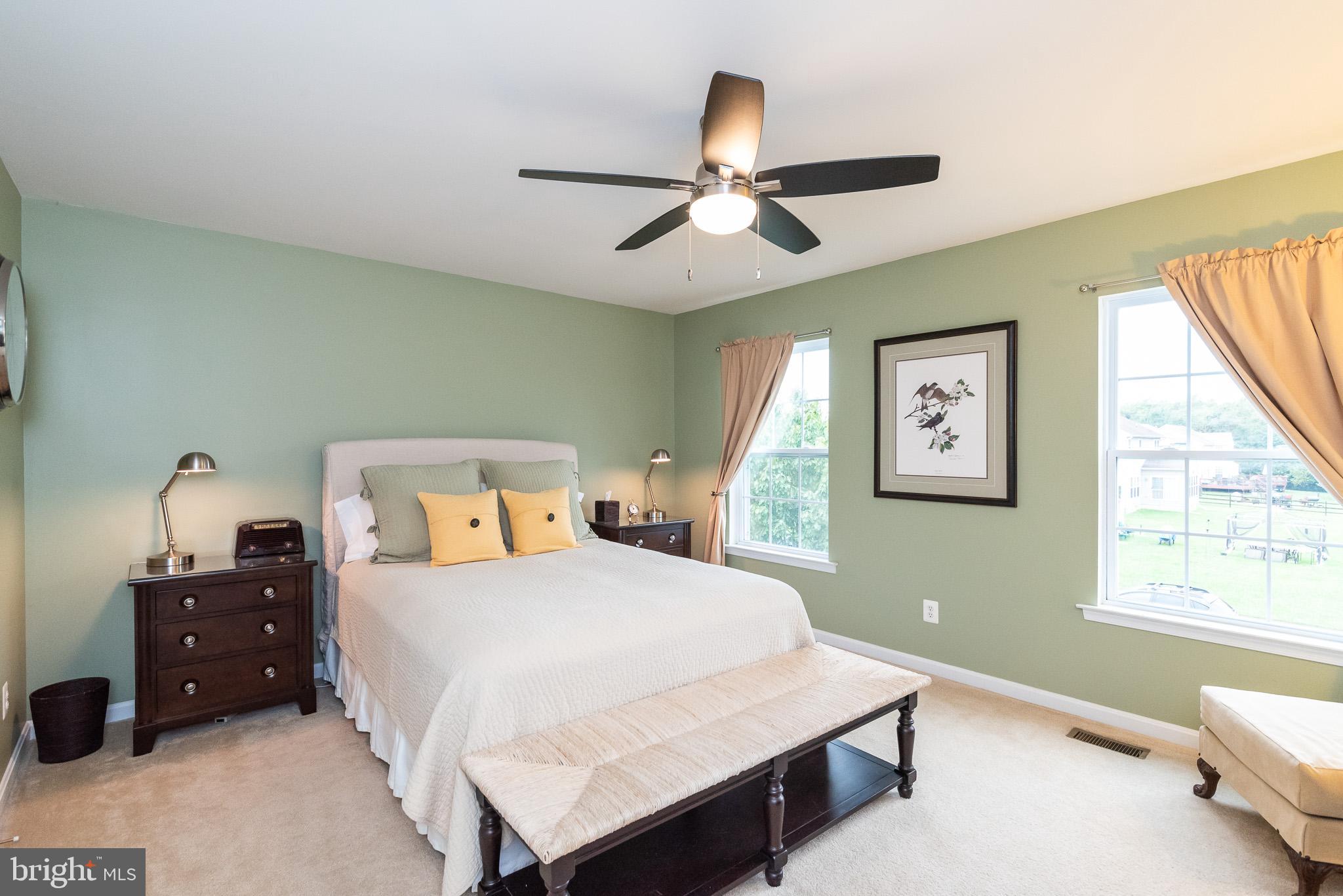 709 Walnut Grove Road Baltimore, MD 21221 - Photo 42 of 52 a bedroom with a bed and a window