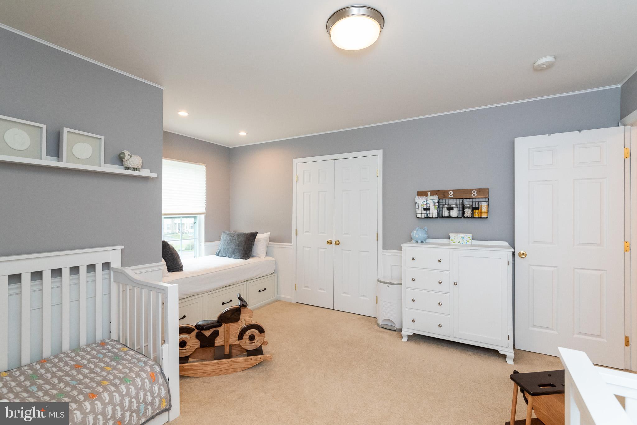 709 Walnut Grove Road Baltimore, MD 21221 - Photo 46 of 52 a bedroom with furniture and a window