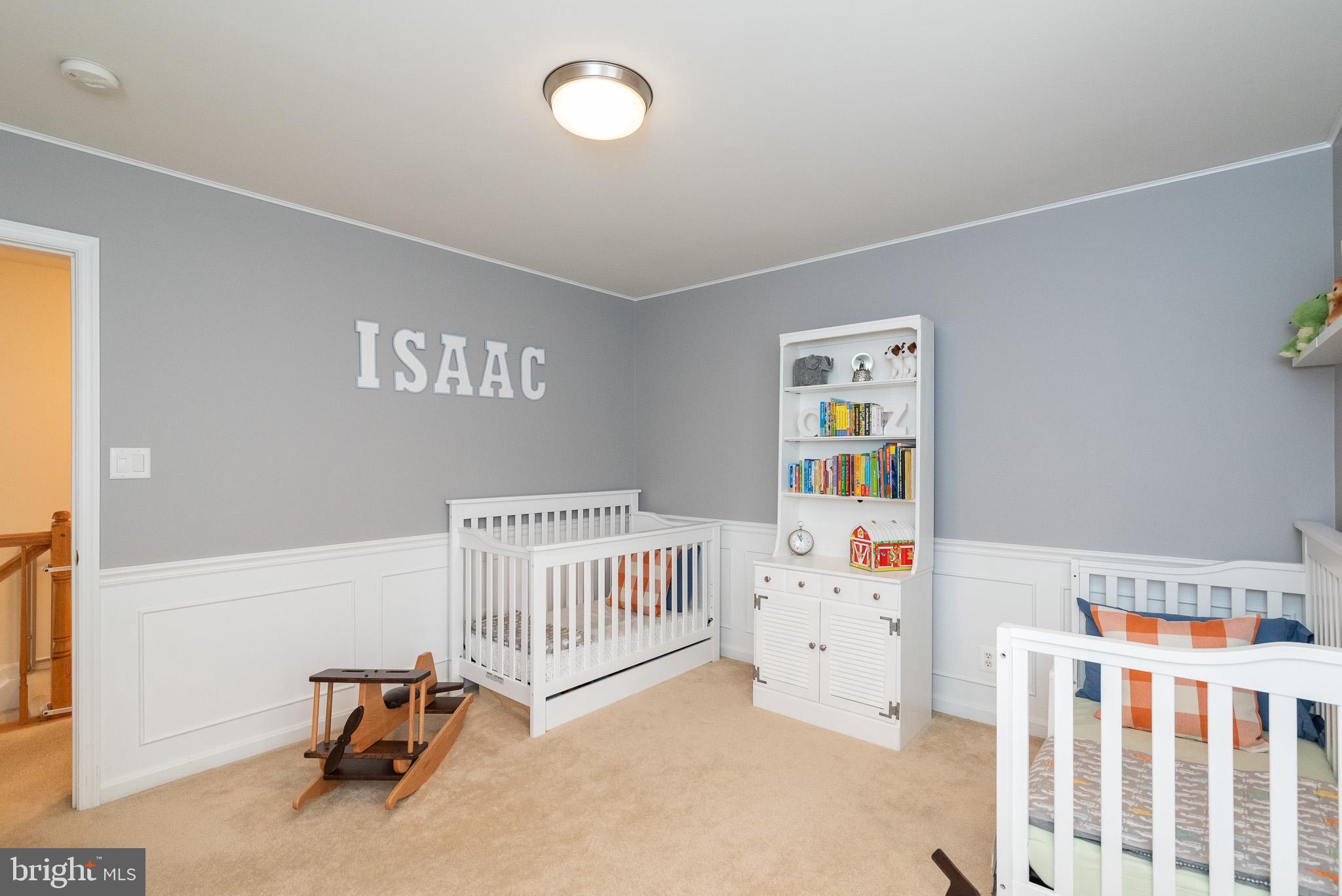 709 Walnut Grove Road Baltimore, MD 21221 - Photo 48 of 52 a bedroom with furniture and white walls