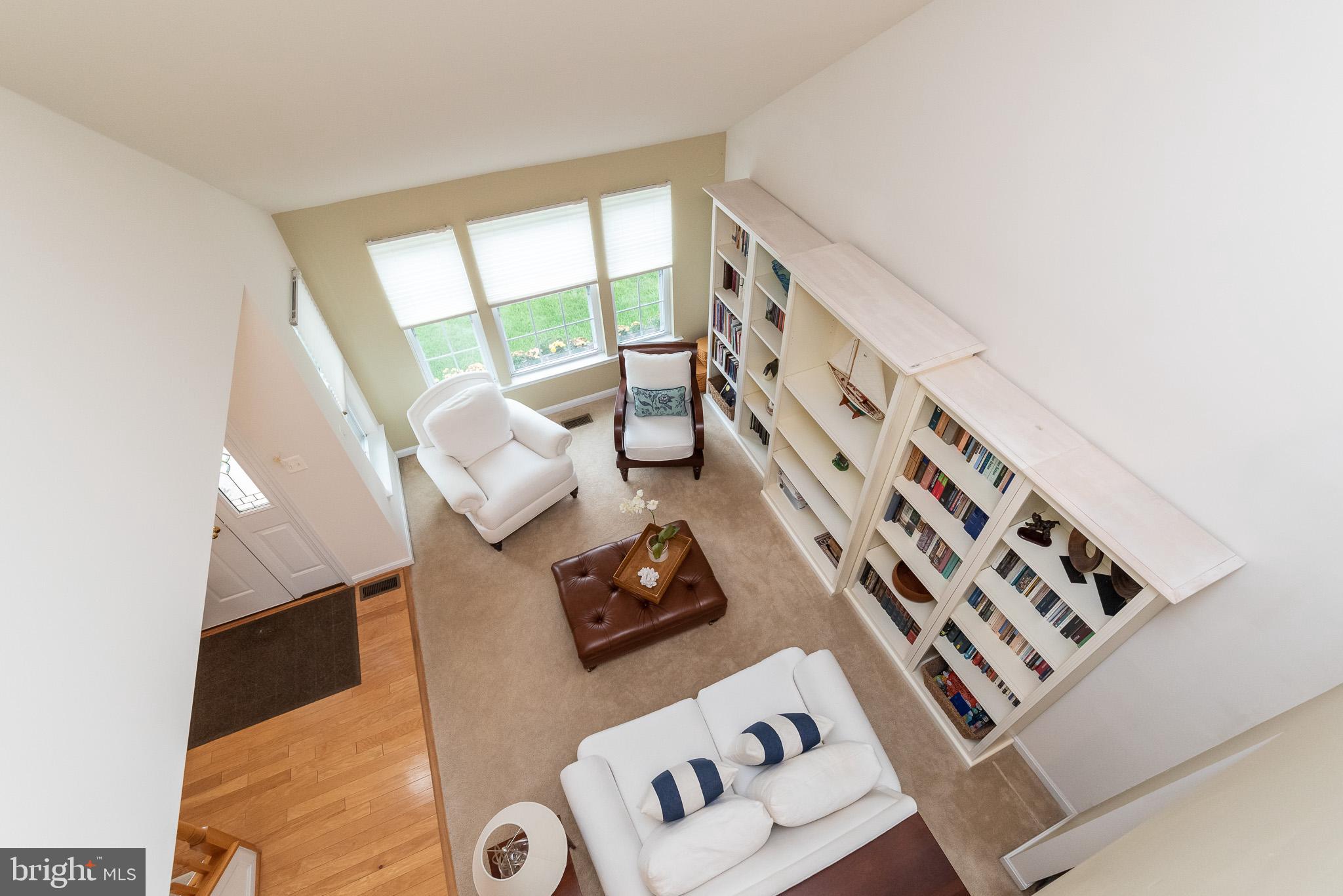 709 Walnut Grove Road Baltimore, MD 21221 - Photo 6 of 52 a living room with furniture and a window