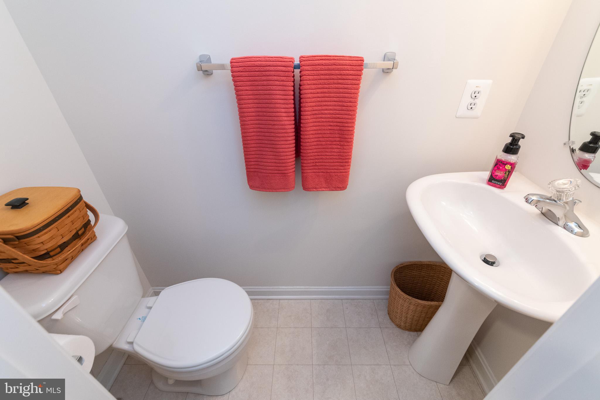 709 Walnut Grove Road Baltimore, MD 21221 - Photo 10 of 52 a bathroom with a toilet and a sink