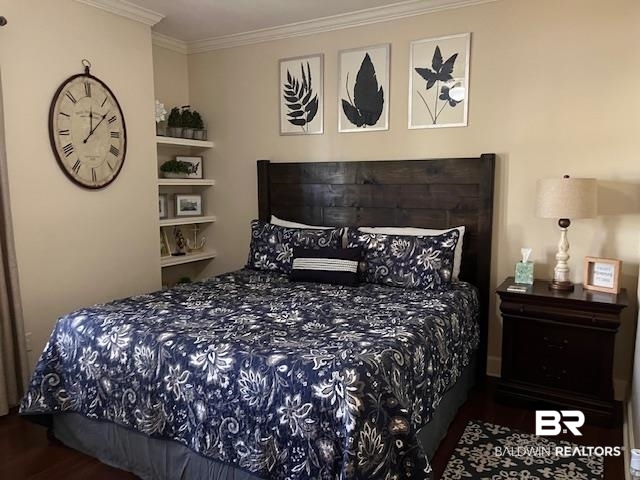 450 Park Avenue, Unit 112 Foley, AL 36535 - Photo 10 of 20 Bedroom featuring ornamental molding and wood finished floors