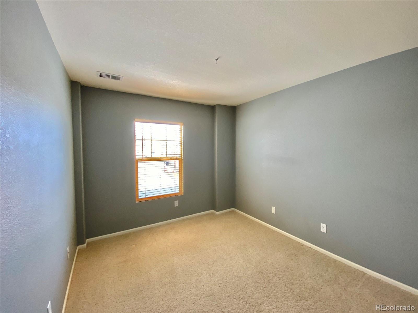5731 Raleigh Circle Castle Rock, CO 80104 - Photo 13 of 16 a view of empty room with window