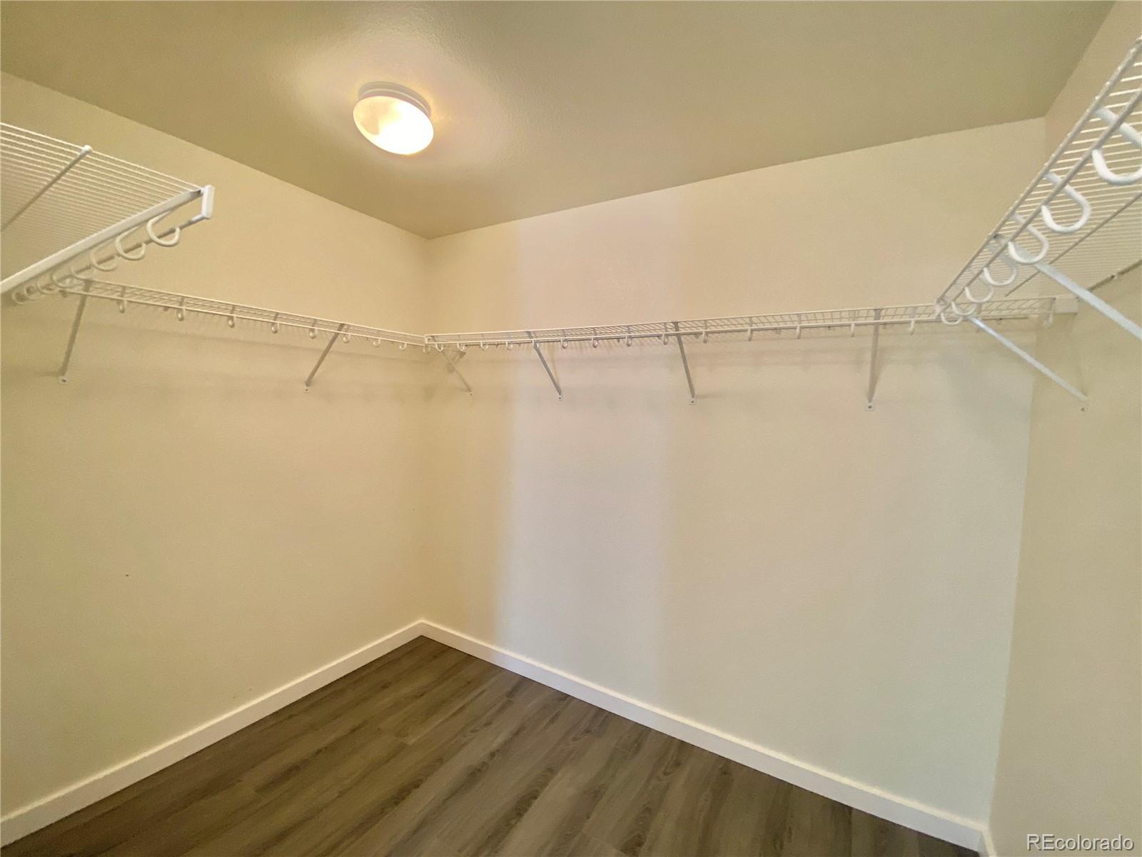 5731 Raleigh Circle Castle Rock, CO 80104 - Photo 8 of 16 a view of a room with racks on the wall