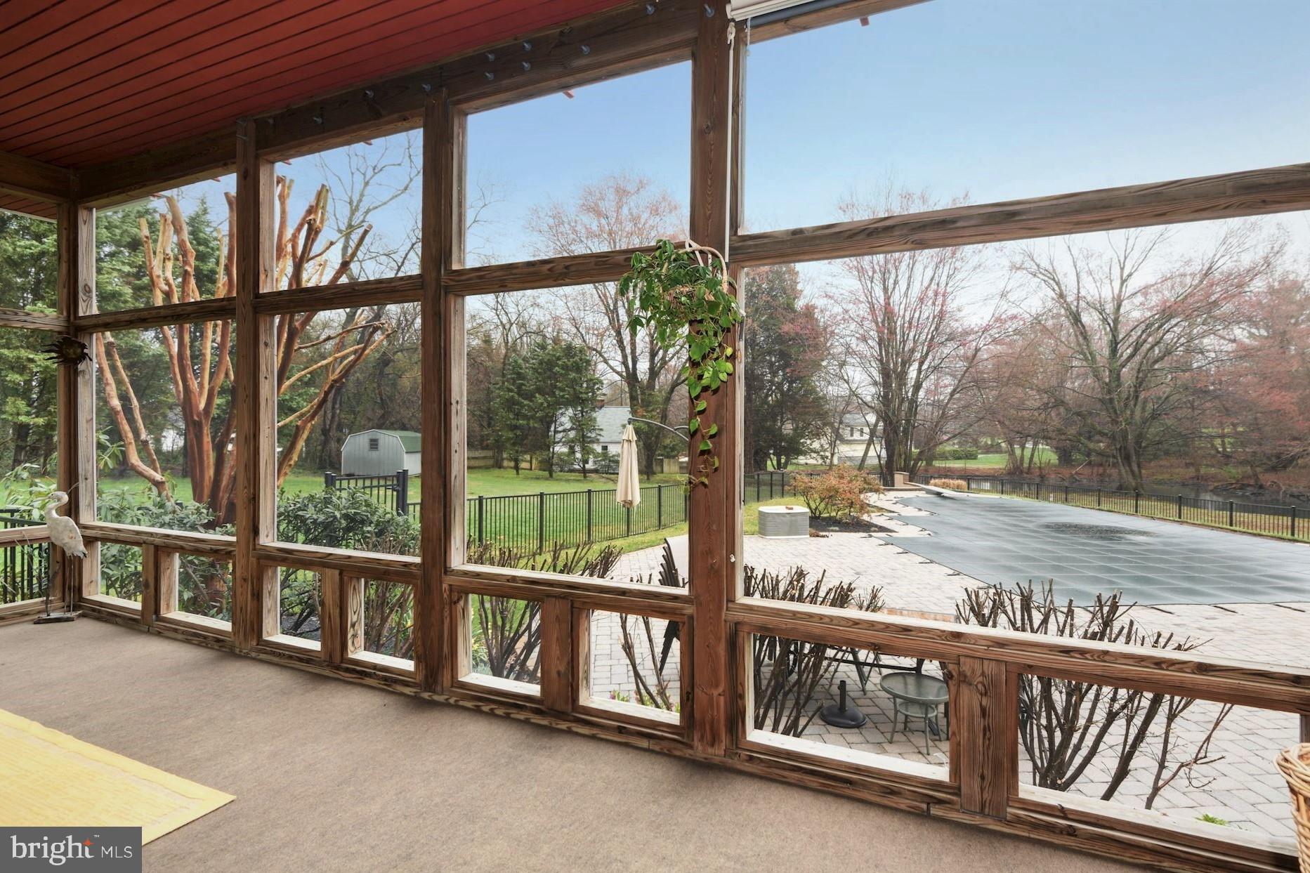 825 Mt Airy Road Davidsonville, MD 21035 - Photo 12 of 42 Step from family room to 12 x 24 screened porch