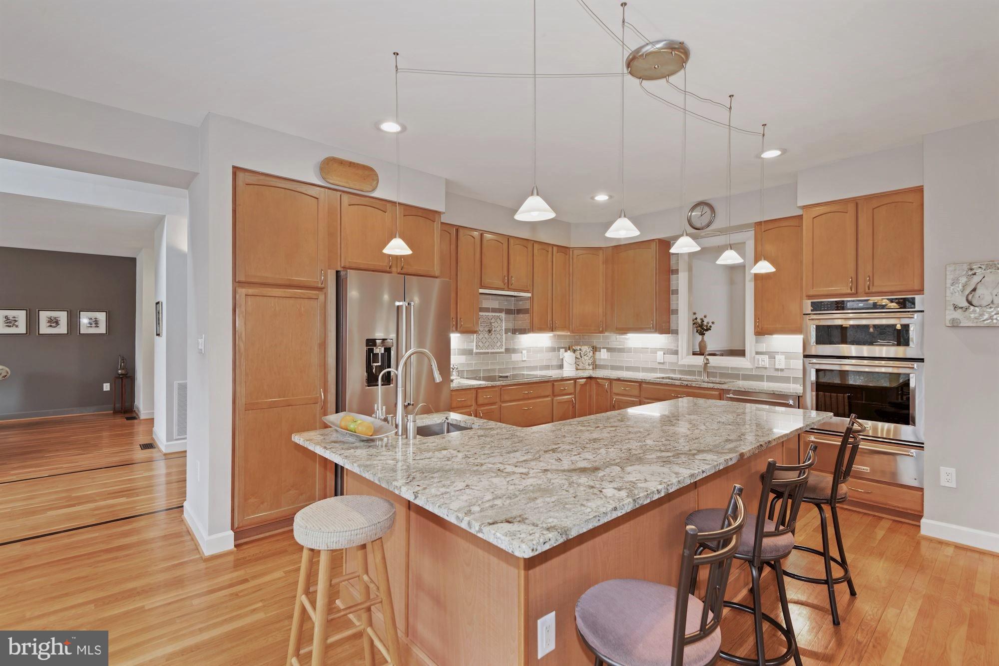 825 Mt Airy Road Davidsonville, MD 21035 - Photo 7 of 42 Chef's kitchen, maple cabinetry, center island