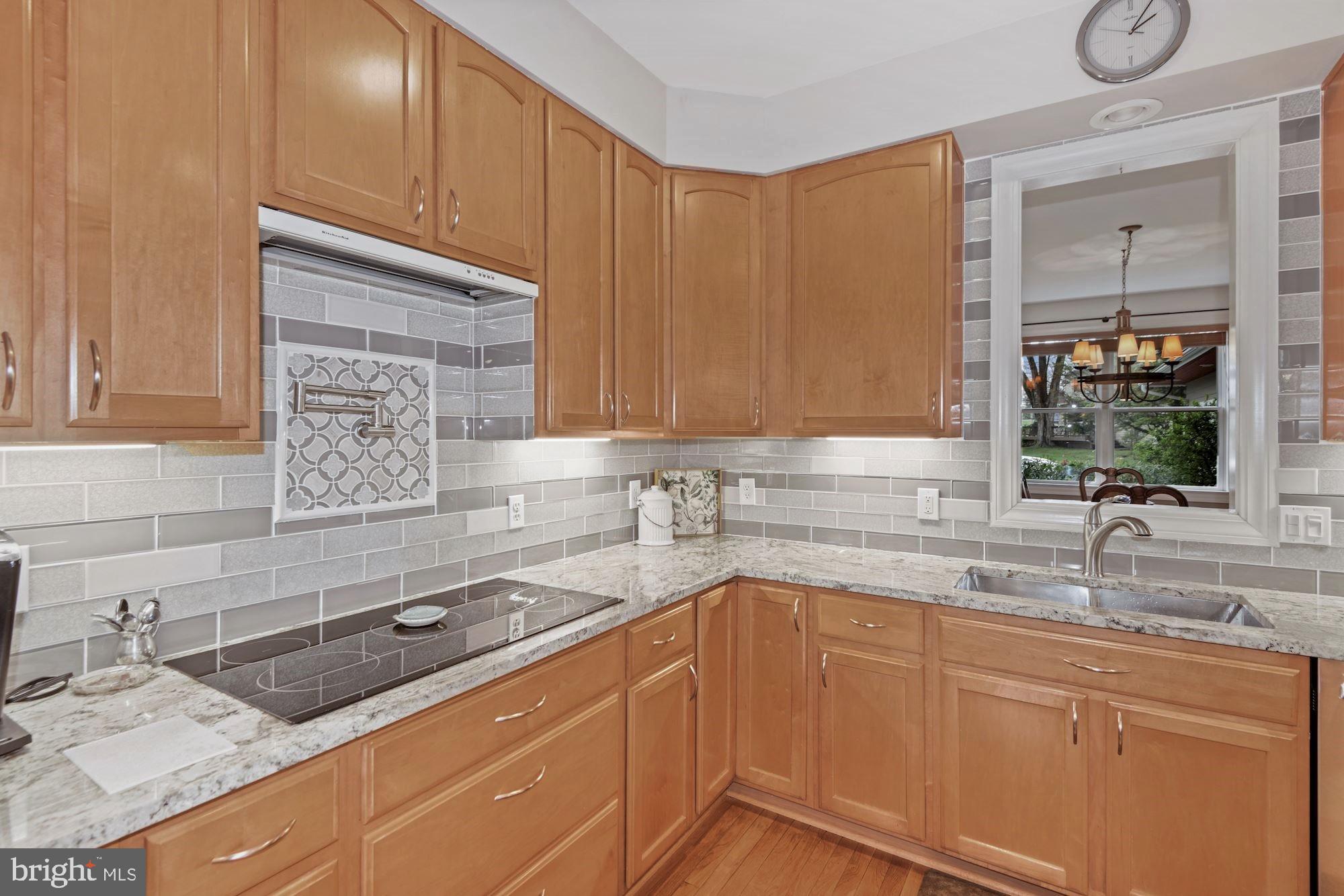 825 Mt Airy Road Davidsonville, MD 21035 - Photo 8 of 42 Newer glass induction cooktop, granite counters