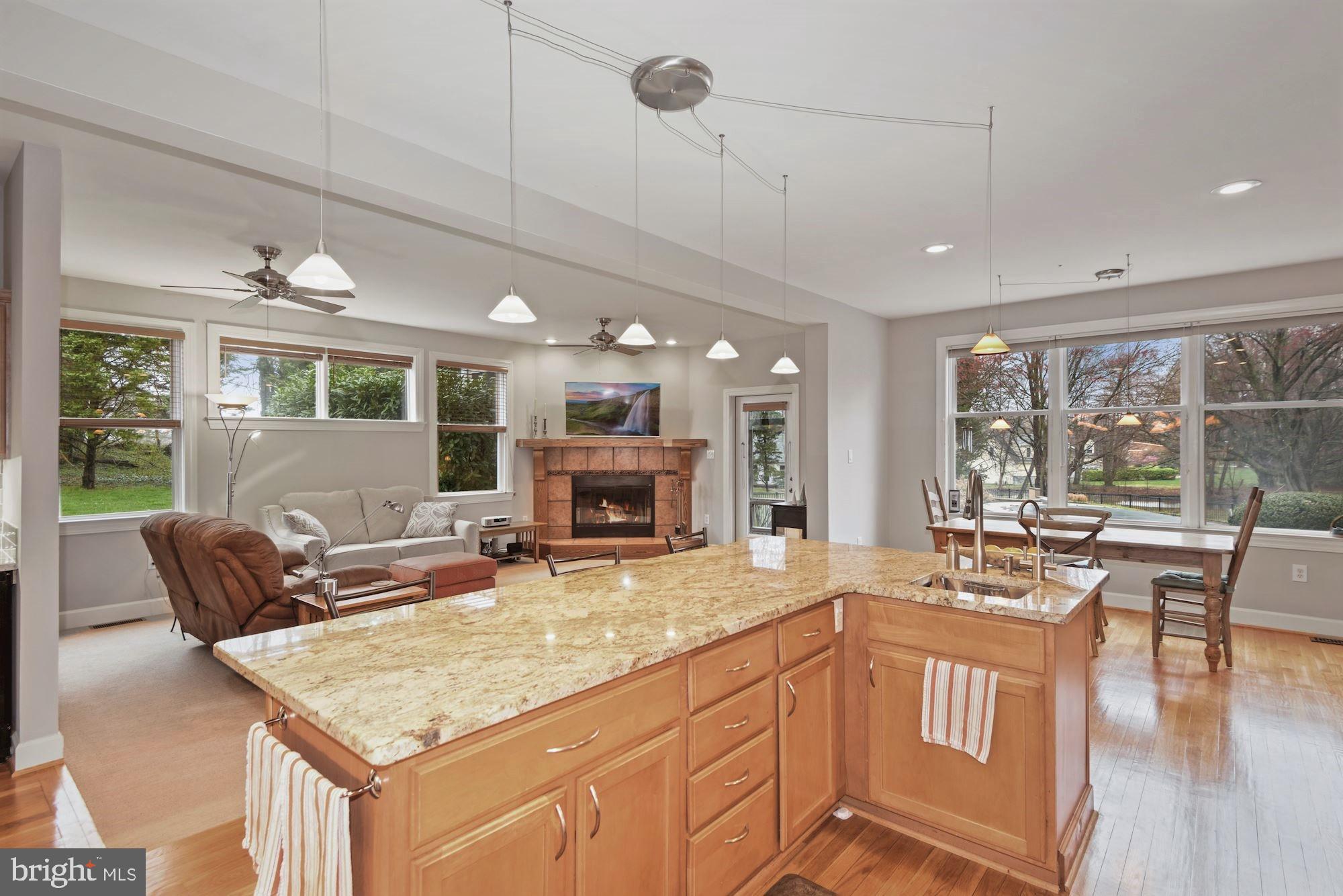825 Mt Airy Road Davidsonville, MD 21035 - Photo 9 of 42 Open plan, wood burning fireplace, breakfast area
