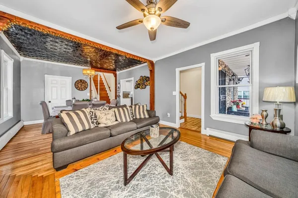 a living room with furniture and a rug
