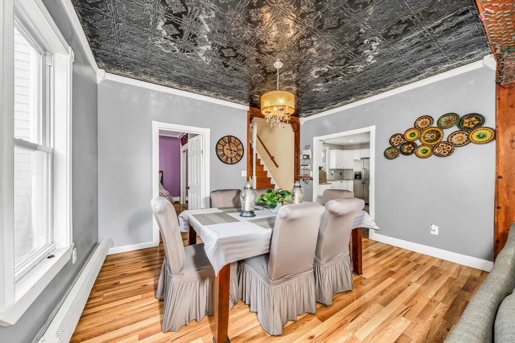 8 Ford Street Haverhill, MA 01832 - Photo 12 of 41 a dining room with furniture and wooden floor