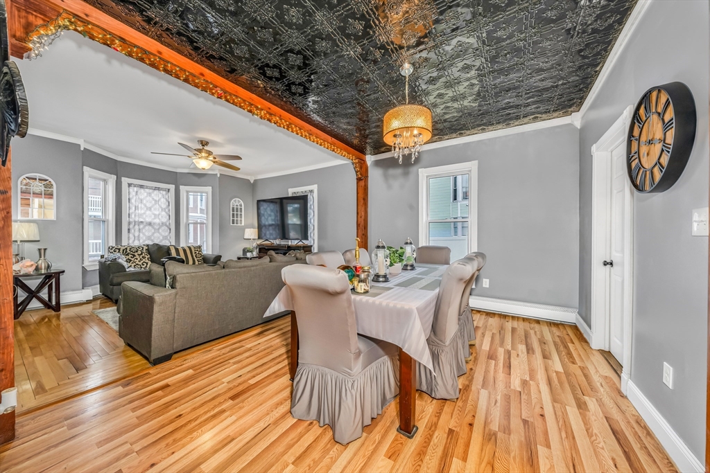 8 Ford Street Haverhill, MA 01832 - Photo 13 of 41 a view of a dining room with furniture window and wooden floor