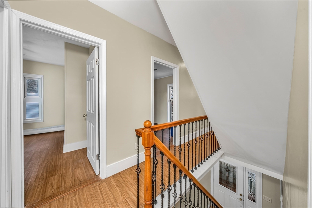 8 Ford Street Haverhill, MA 01832 - Photo 22 of 41 a view of a hallway with wooden floor and entryway