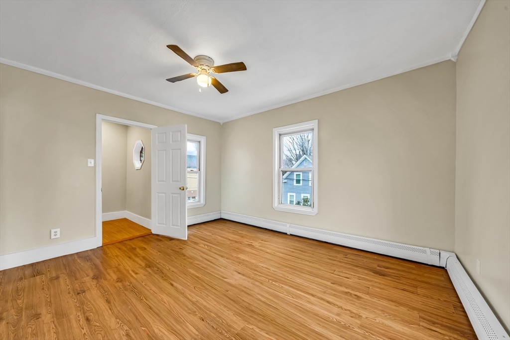 8 Ford Street Haverhill, MA 01832 - Photo 26 of 41 a view of empty room with wooden floor and fan