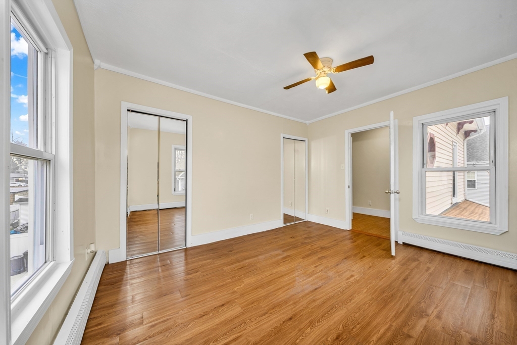 8 Ford Street Haverhill, MA 01832 - Photo 29 of 41 a view of empty room with wooden floor and fan