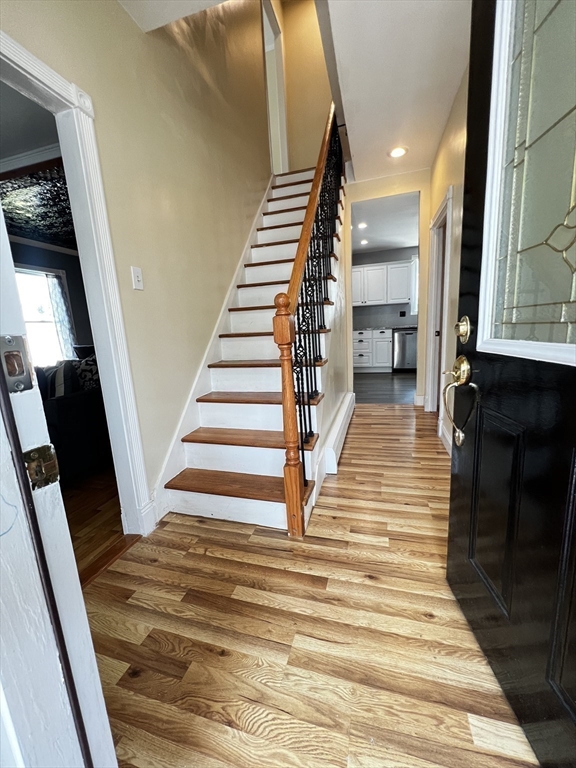 8 Ford Street Haverhill, MA 01832 - Photo 9 of 41 a view of entryway and hall with wooden floor
