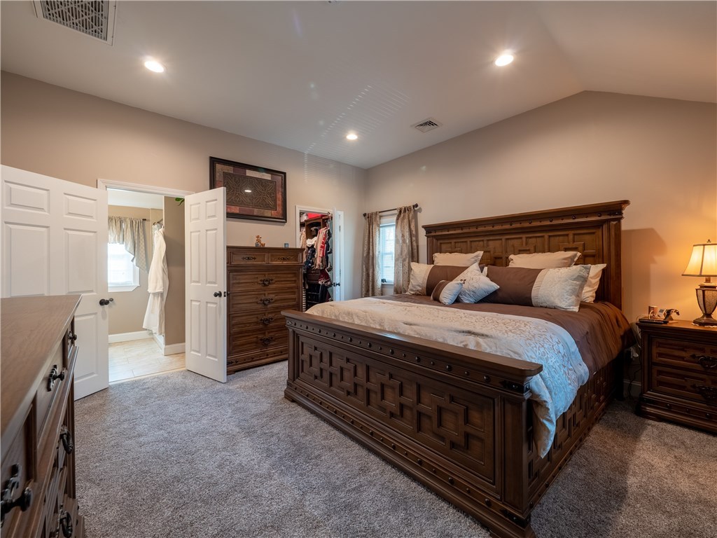 303 Crestwood Road Warwick, RI 02886 - Photo 20 of 43 Master Suite with cathedral ceiling, walk-in closet and full bathroom.