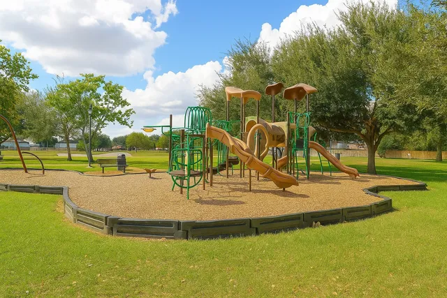 a view of a park with swings