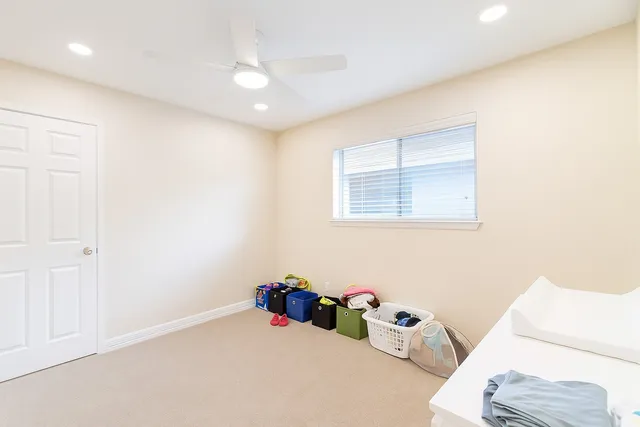 a room with toys and dresser