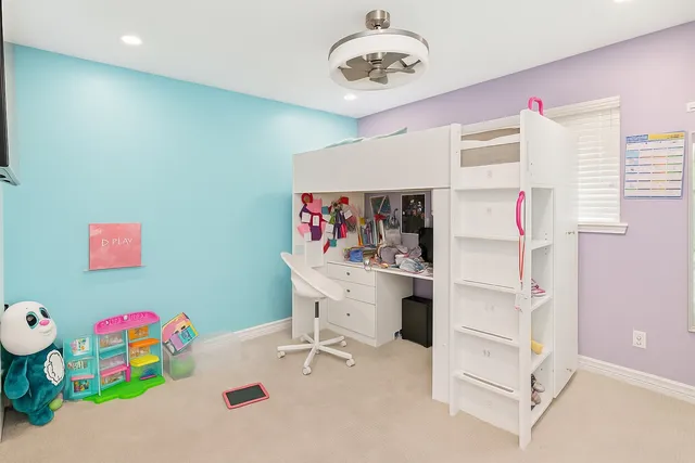 a view of a room with baby toys