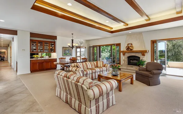 a kitchen with stainless steel appliances granite countertop sink stove and refrigerator