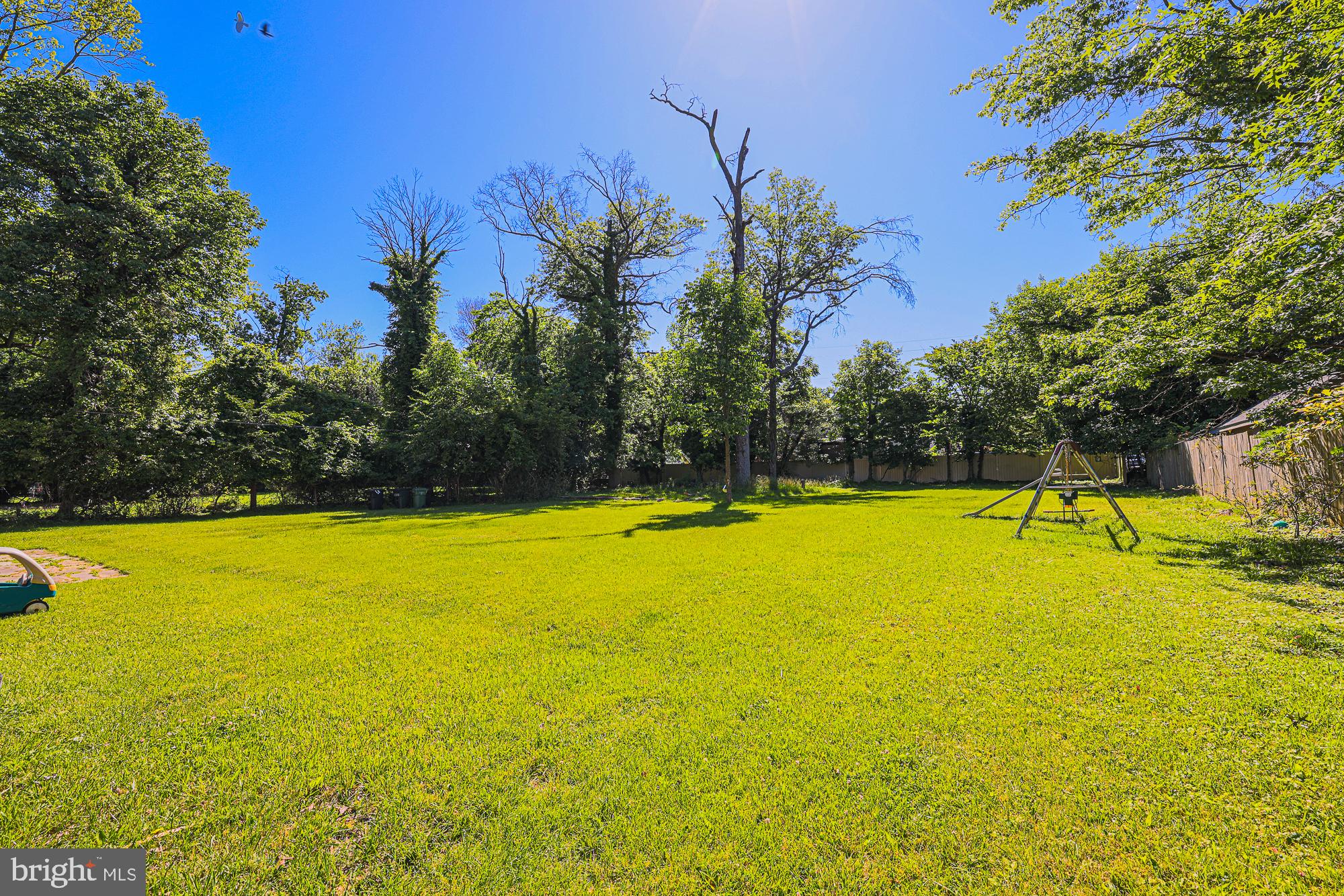 3305 Bancroft Road Baltimore, MD 21215 - Photo 17 of 61 Spacious green oasis under blue skies.