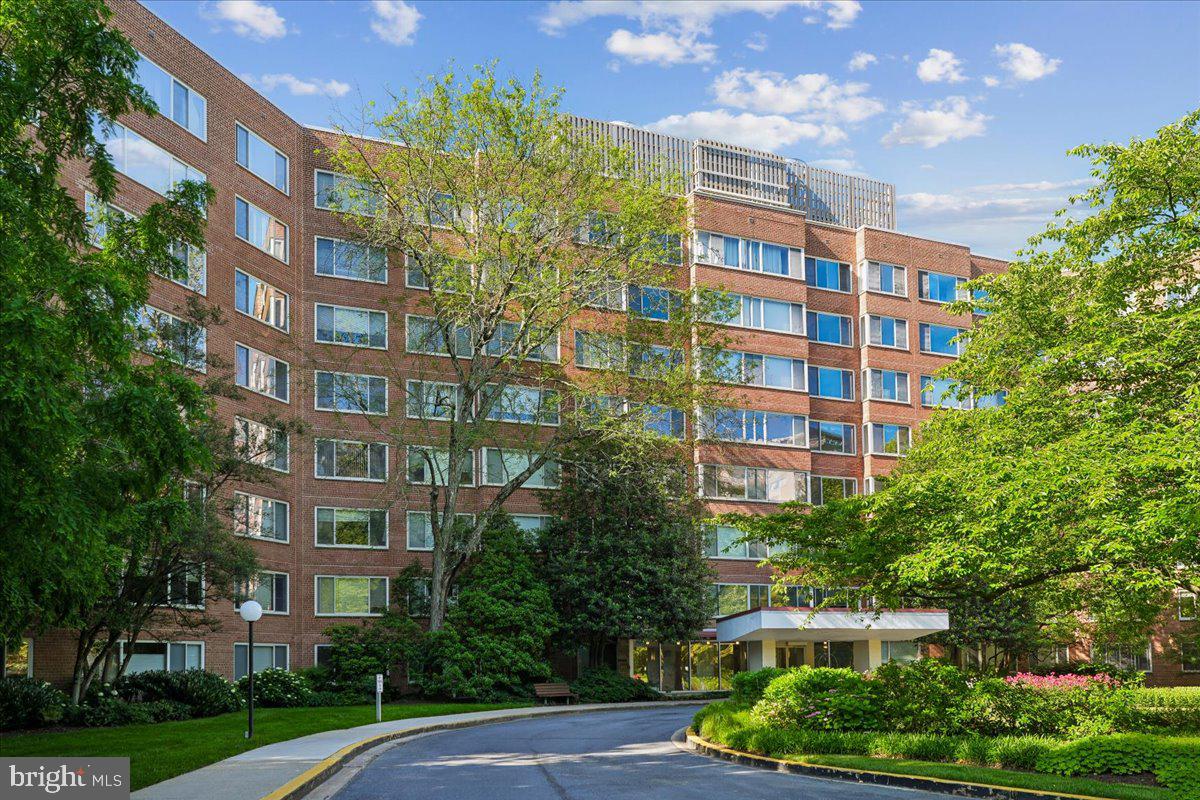 4000 Tunlaw Road Northwest, Unit 1003 Washington, DC 20007 - Photo 2 of 25 Modern living amidst lush greenery.
